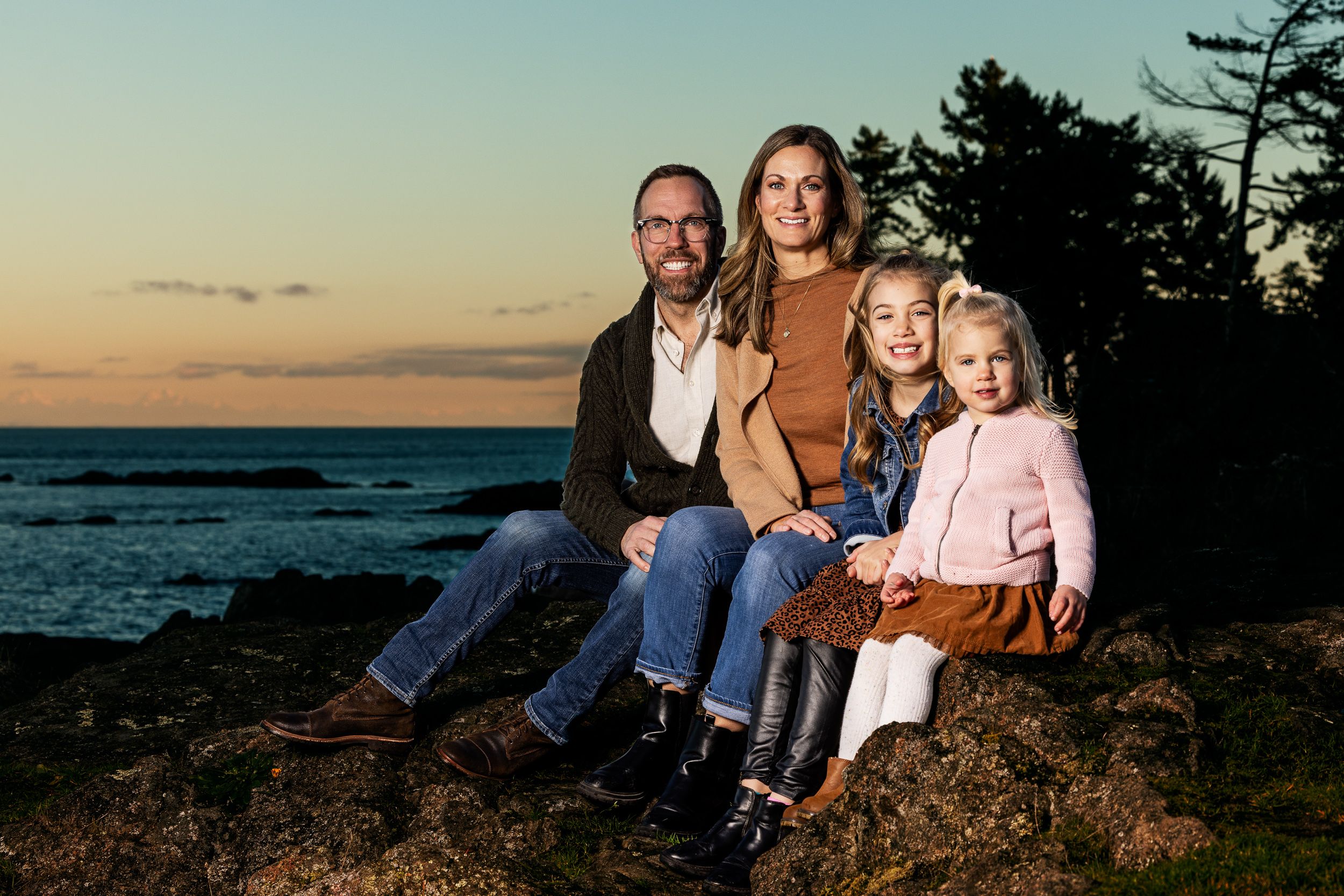 Family together in an open field in October