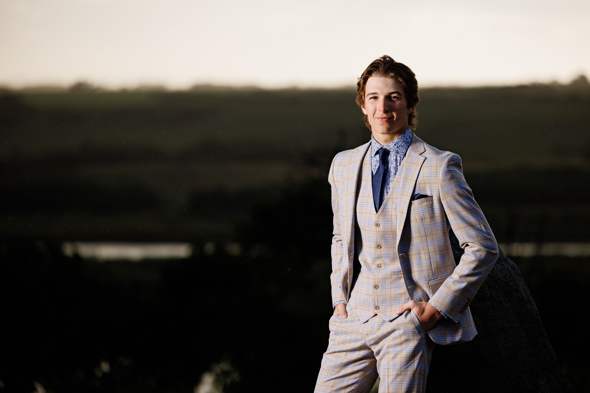 Young man photographed on location at golden hour