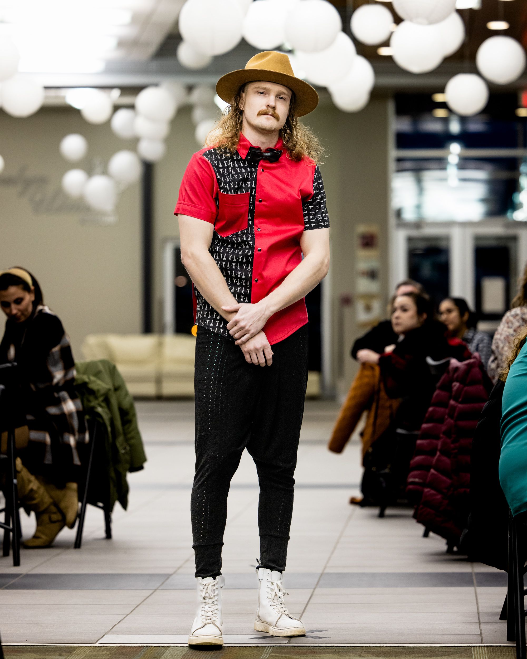 Model on the runway at a community fashion show