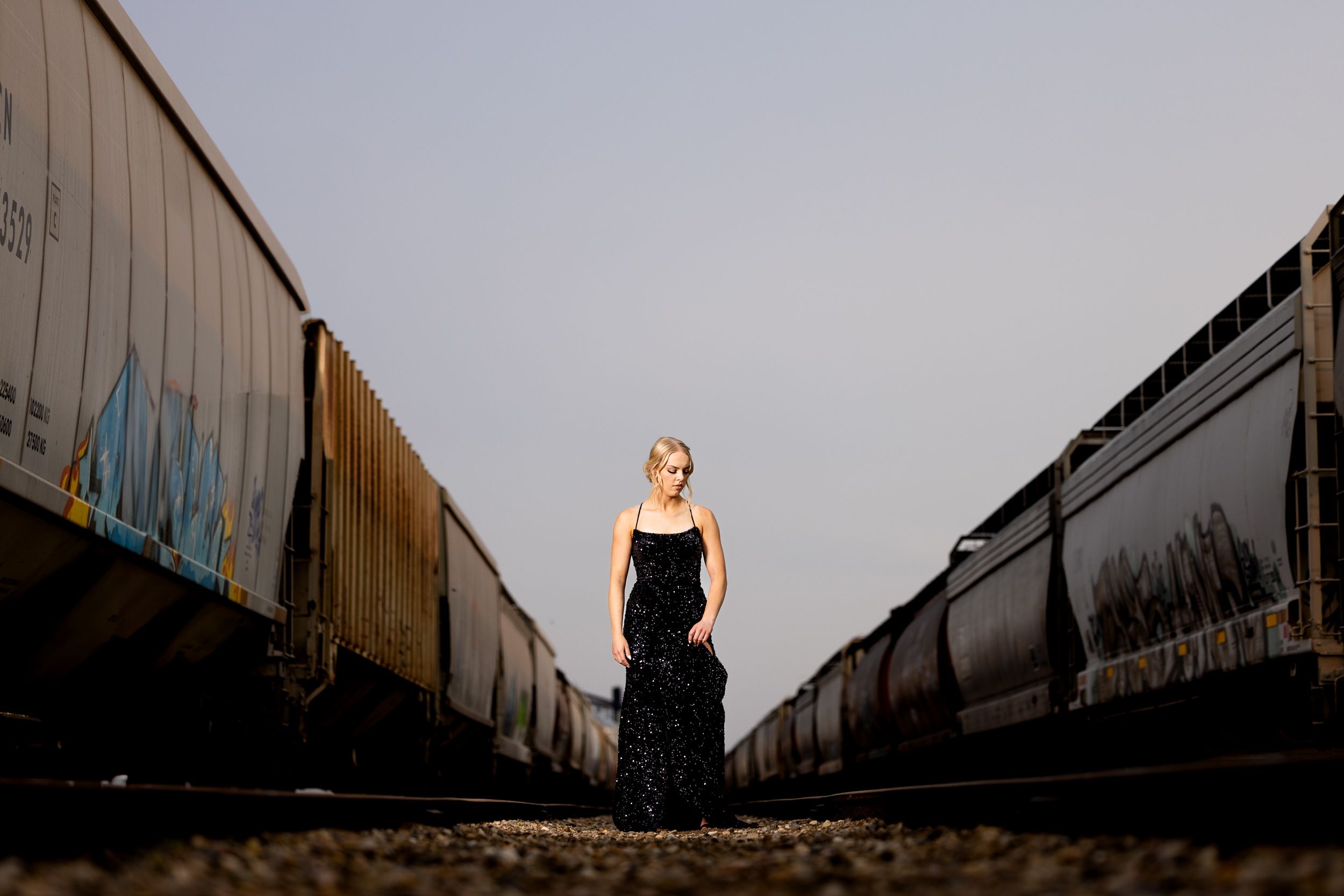 Grad on a country road under a big prairie sky